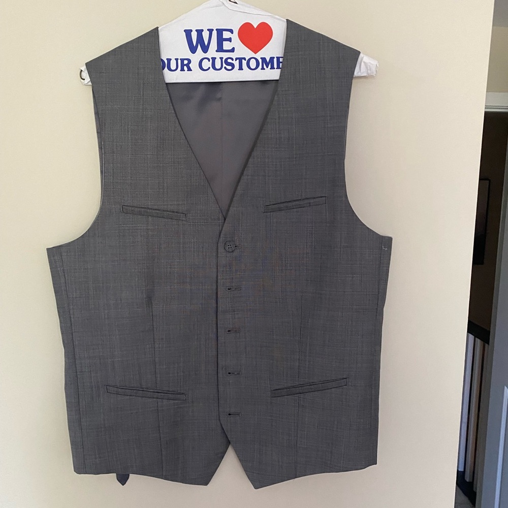 Grey waistcoat. Stylish and cool. Great for layering or on its own
